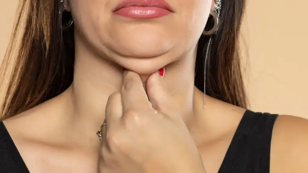 An image of a woman with double chin, sad, worried : Non Surgical Double Chin Removal Treatment in Barnet, UK